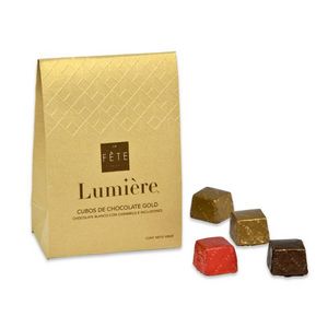 Oferta de Cubos con chocolate Gold Lumière 100 g por $6900 en La Fête Chocolat