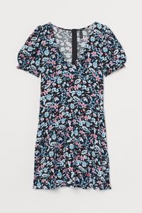 Oferta de Vestido con mangas globo por $4000 en H&M
