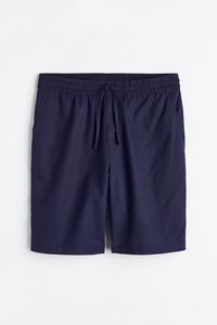 Oferta de Shorts en mezcla de lino Loose Fit por $9495 en H&M