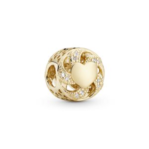 Oferta de Charm de oro calado Corazón con listón por $824600 en Pandora